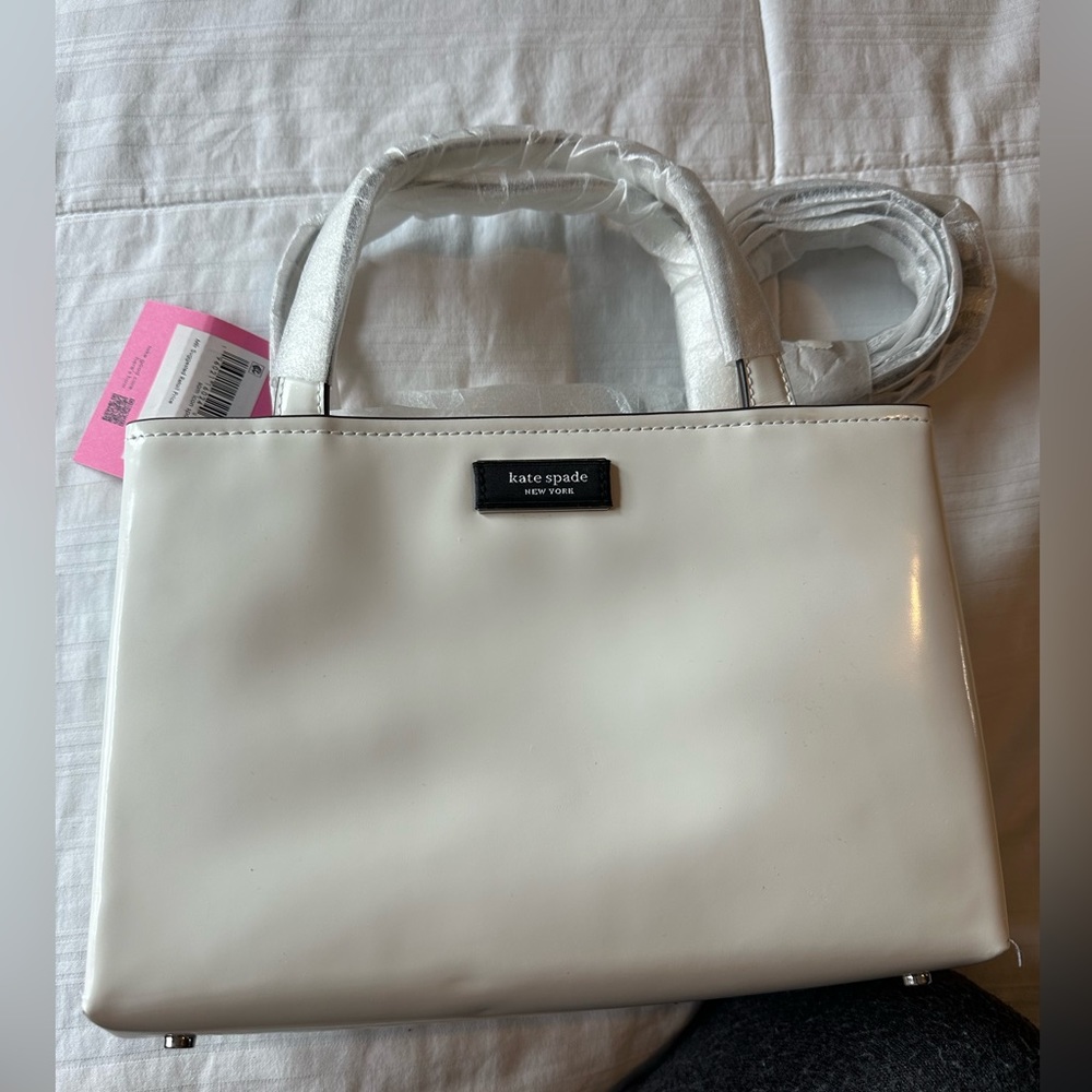 BRAND NEW KATE SPADE TOTE THAT CAN TURN INTO CROSS BODY